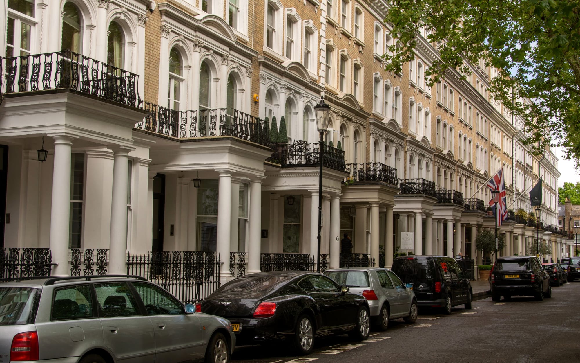 A cream-painted Georgian terrace overlooking a private garden square in Belgravia