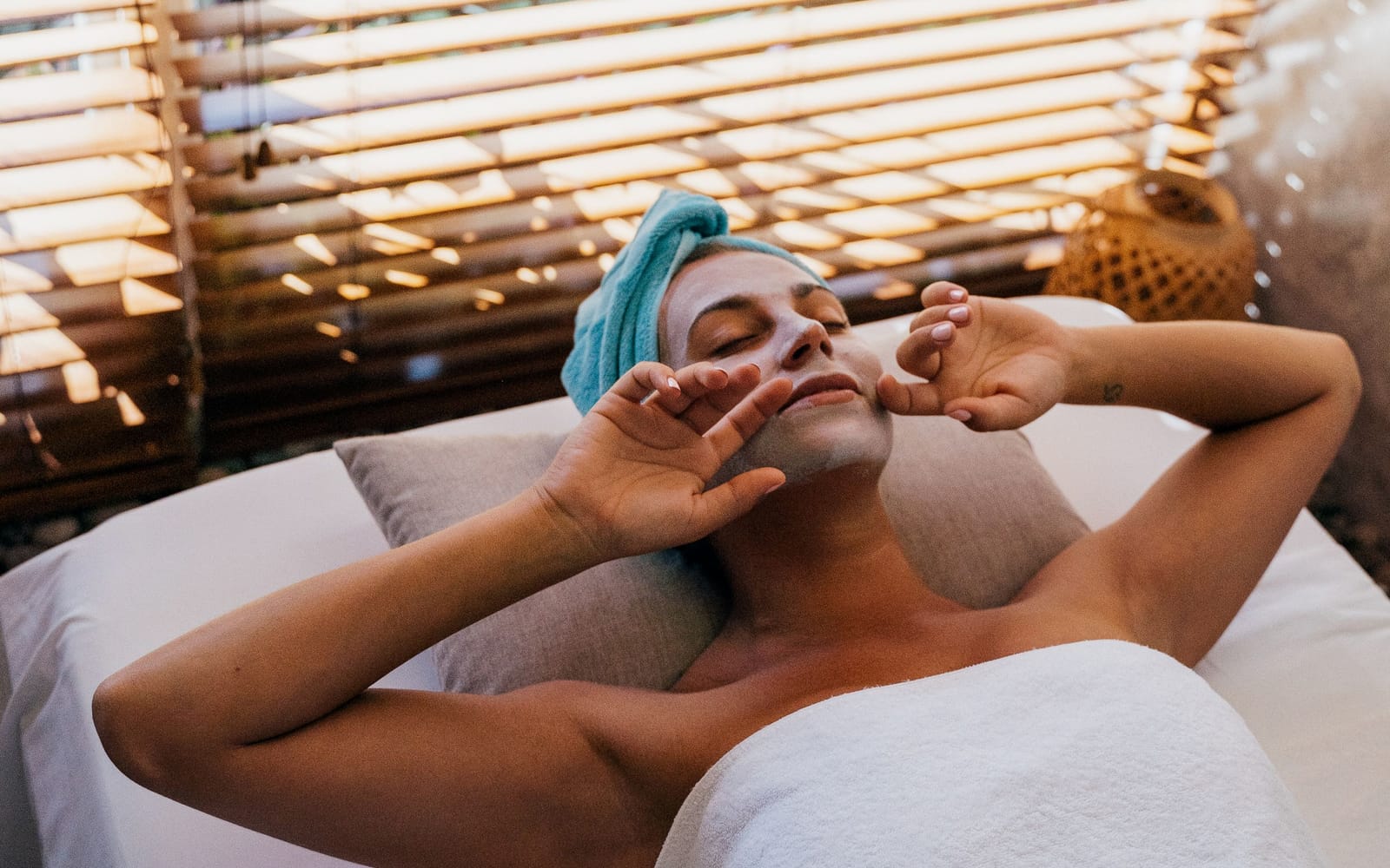 A calm treatment underway on a portable table in a bright room
